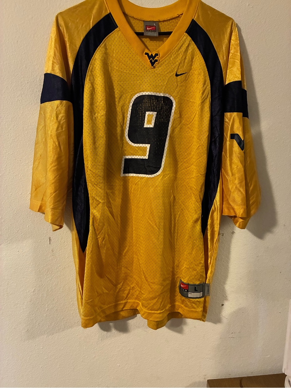 Vintage Nike Men's West Virginia Gold and Navy Football Jersey with Number 9